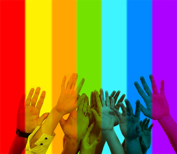 Collage of rainbow flag and human hands isolated on white background. Male and female hands over homosexual friendly rainbow background. Concept of LGBT, activism, community and freedom. - Foto, Imagem
