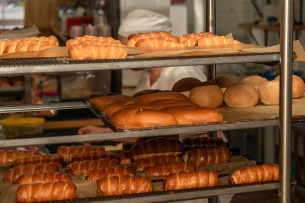 Bakery with various types of pastries, bread and rolls - Φωτογραφία, εικόνα