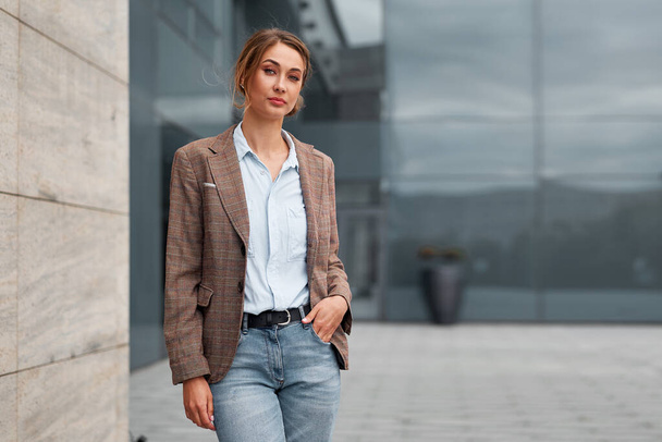 Businesswoman successful woman business person standing outdoor corporate building exterior Pensive elegance cute caucasian confidence professional business woman middle age female Bank worker - Foto, Bild