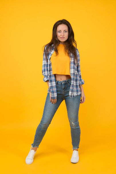 Fashion appeal. Fashion look of pretty woman. Sexy woman yellow background. Vogue model in casual style. Closet essentials. Trendy style. Clothing you want to wear - Фото, зображення