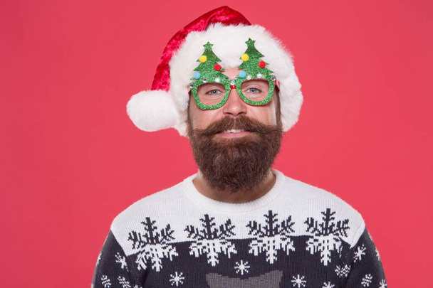 bearded santa claus man with moustache wear hat and knitted sweater for xmas party, holiday fun - Foto, afbeelding