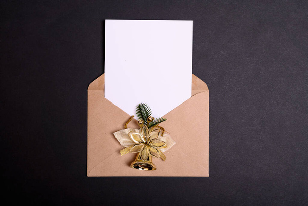 Envelope letter with an empty gladent and a place for text on a black background. - Foto, Bild