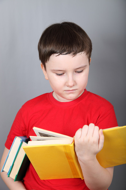 Boy with book s - Foto, immagini