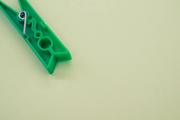 A top view of plastic clothespin isolated on a light surface - Photo, Image