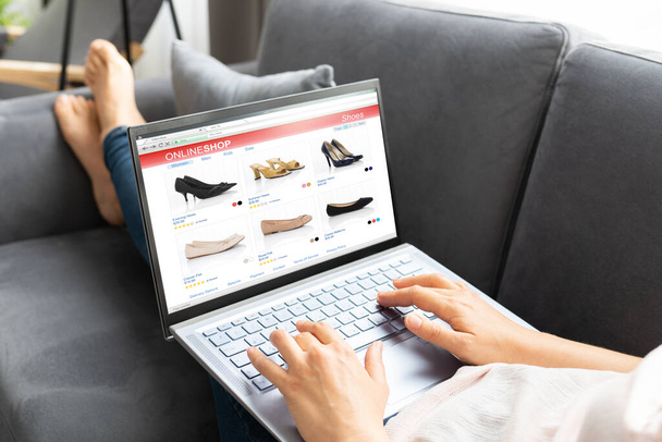 Woman Online Ecommerce Shopping Using Laptop On Sofa - Fotoğraf, Görsel