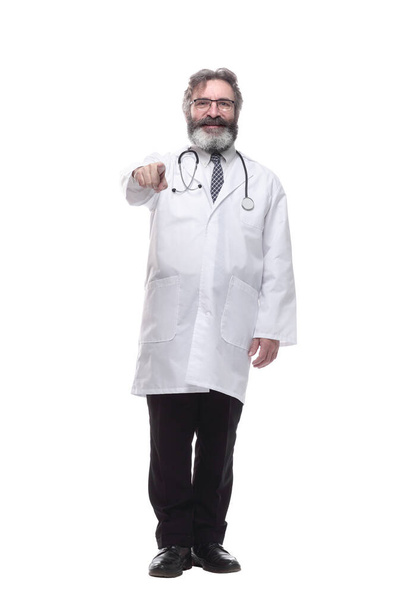friendly doctor looking at you. isolated on a white - Foto, imagen