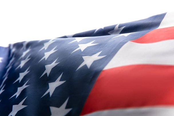 Csillagok és csíkok. Közelkép az amerikai zászló fehér háttér. - Fotó, kép