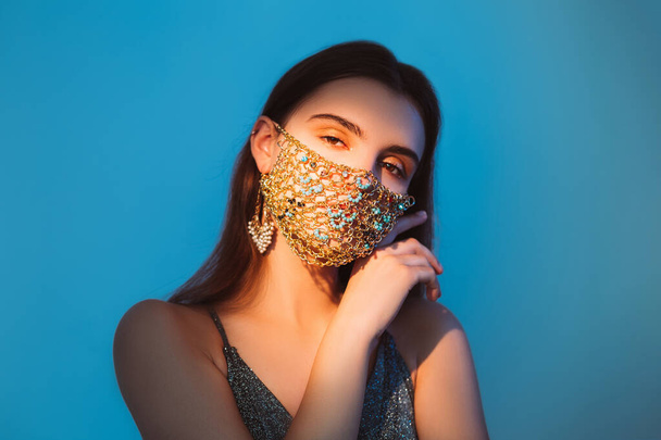 pandemic jewelry glamour look woman creative mask - Foto, afbeelding