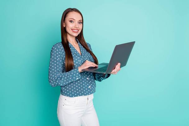 Photo of positive agent girl work laptop wear polka-dot clothes isolated over turquoise color background - Foto, Imagem