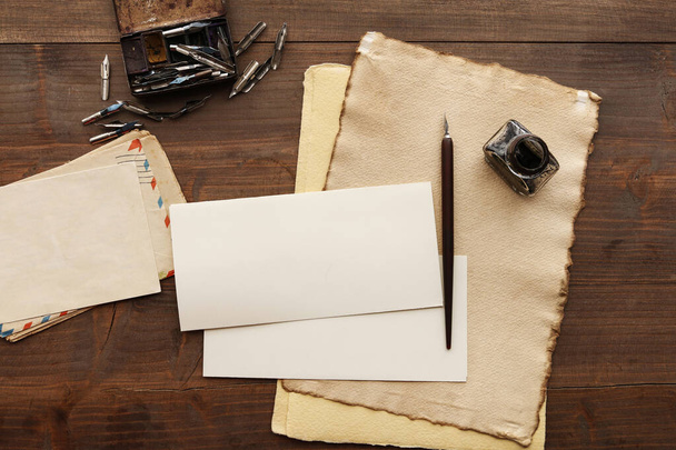 Vintage sheets of paper on wooden table, copy space. Traditional correspondence concept. - Fotoğraf, Görsel