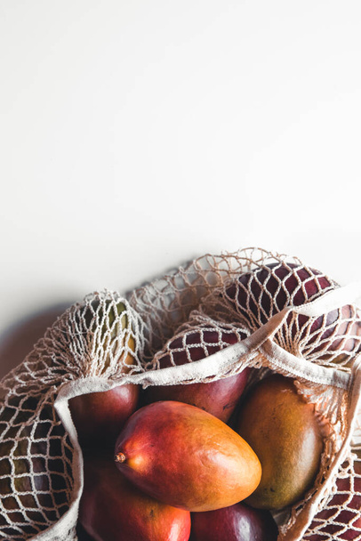 Mango on a white background. Healthy food, healthy lifestyle. - Фото, зображення