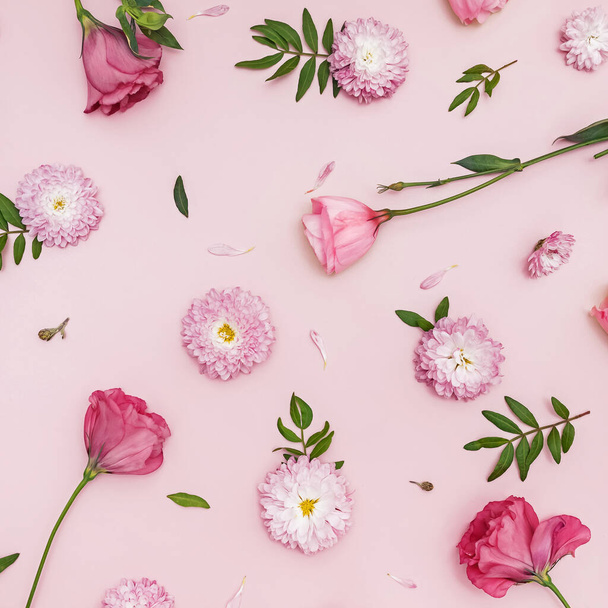 Creative flat lay composition with flowers, leaves and petals. - Photo, Image
