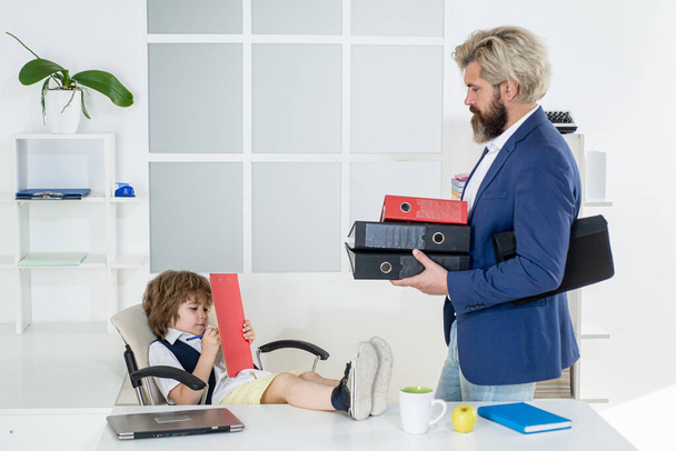Family business. Boss and businessman working together in office. Small family business. Baby boss. Funny kids. Future education, proffesion. - Фото, зображення