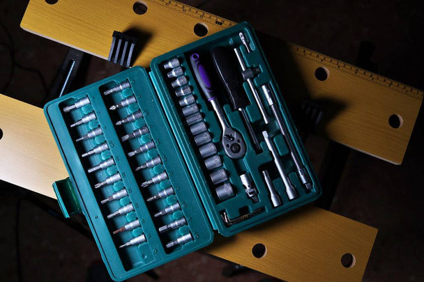 DIY toolbox. Interchangeable wrench set, ratchet wrench, screwdriver heads, philips tip, torque tip. Quality tempered metal and vanadium chrome - Фото, зображення