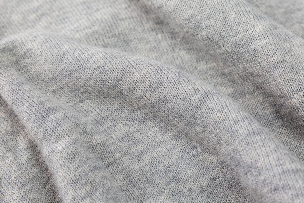 Texture of gray knitted fabric. Background. Space for text. - Foto, Imagem