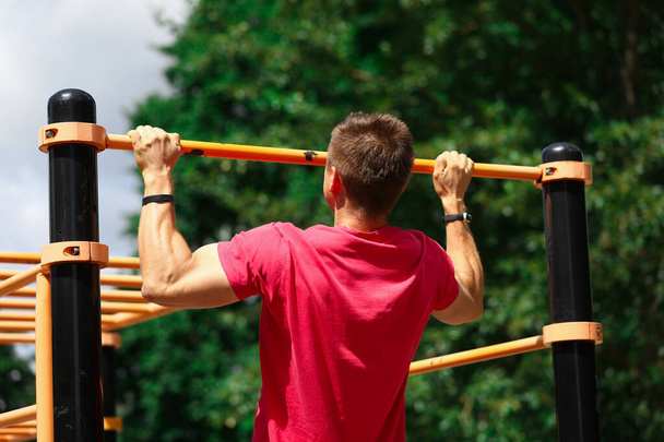 Man working out in park - Photo, image