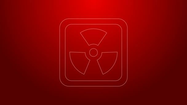 Zelená čára Radioaktivní ikona izolovaná na červeném pozadí. Radioaktivní toxický symbol. Značka radiačního nebezpečí. Grafická animace pohybu videa 4K - Záběry, video