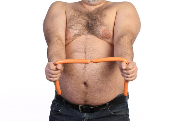 Fat man and sausages - Фото, изображение