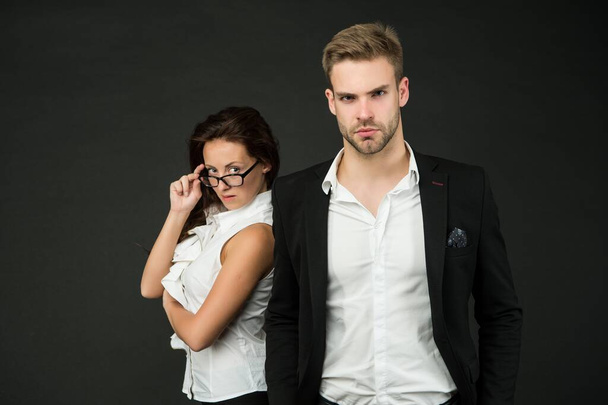 Professional couple of sexy woman and handsome man in formal wear dark background, fashion - Φωτογραφία, εικόνα