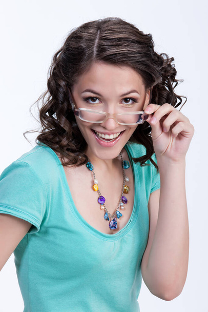 Young beautiful woman with glasses - Фото, изображение