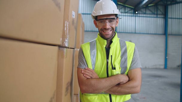 Professional industry worker close up portrait in the factory or warehouse - 写真・画像