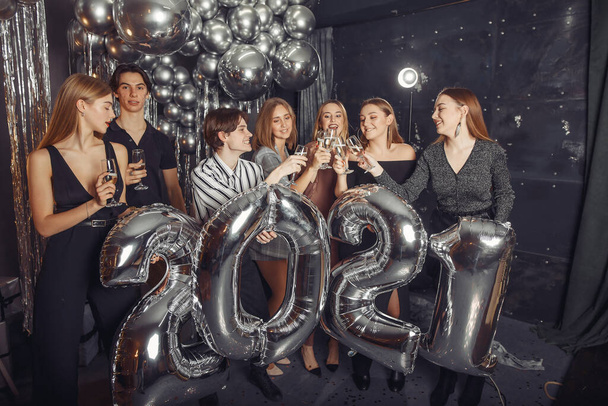 People celebrating a new year with a big ballons - Photo, Image