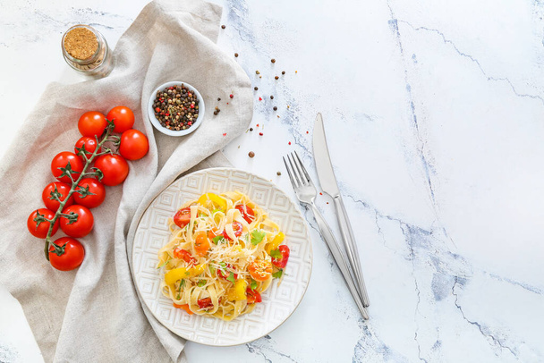 Plate with tasty pasta primavera on white background - Zdjęcie, obraz
