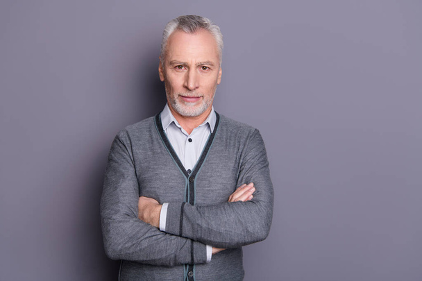 Portrait of his he nice-looking attractive candid content top manager financier business shark economist banker folded arms isolated over gray pastel background - Foto, imagen