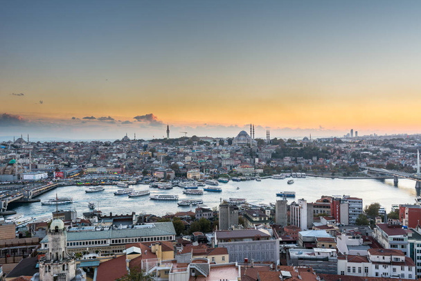 Aerial view of golden horn in the strait of Bosporus under sunset from the gala tower in Istanbul, Turkey, view from the Galata tower. - Valokuva, kuva