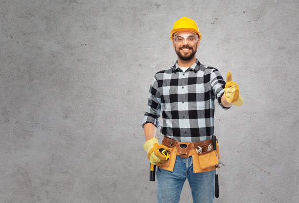 happy male worker or builder showing thumbs up - Photo, Image