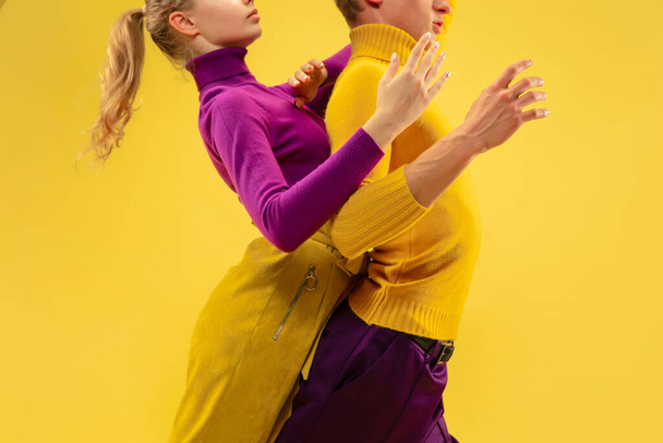 Portrait of two friends going crazy, having fun. Bright clothes, trendy colors. - Photo, Image