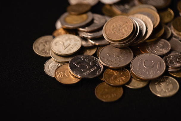 coins on black background, funeral concept - Photo, Image