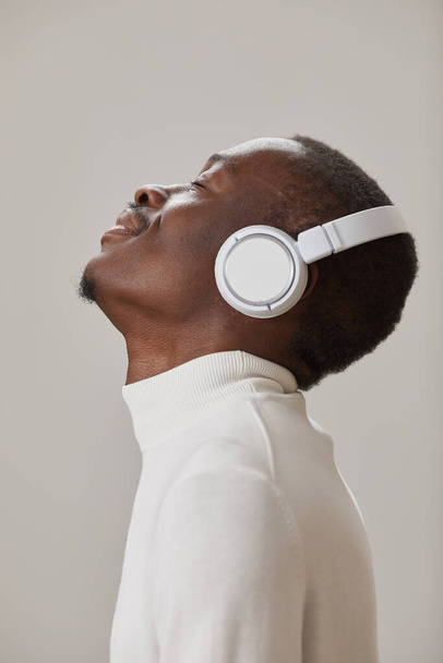 Enjoying the music in headphones - Photo, Image