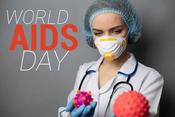 Sairaanhoitaja omistaa abstrakti virus Maailman AIDS Day käsite. - Valokuva, kuva