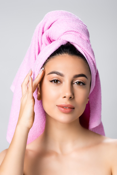 beautiful woman with towel on hair isolated on grey - Zdjęcie, obraz