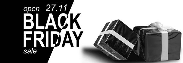 black and white gift boxes with the text black friday - Photo, Image