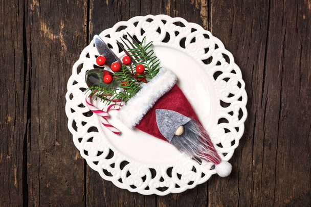 Christmas table place setting with Christmas decorations, top view with copy space. Winter Holidays background. - Photo, Image
