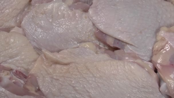 Rotation of raw chicken meat close up. Chicken thighs. - Footage, Video