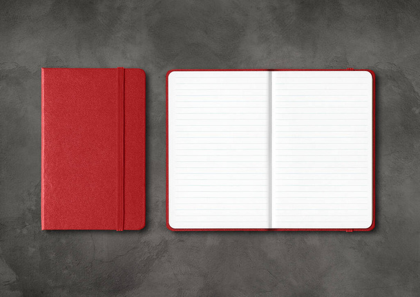 Dark red closed and open lined notebooks mockup isolated on black concrete background - Fotoğraf, Görsel