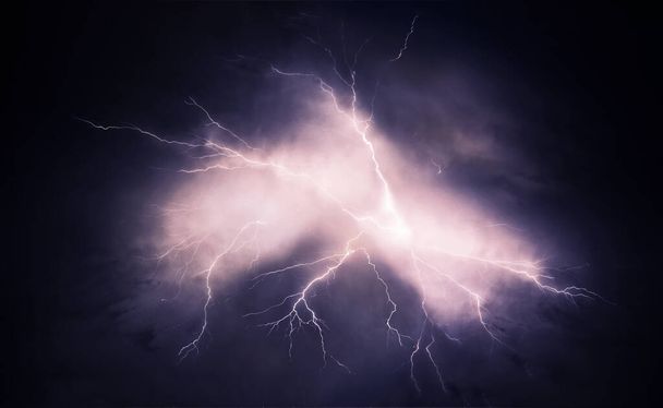 powerful bright lightning burst on the night sky 2020 - 写真・画像