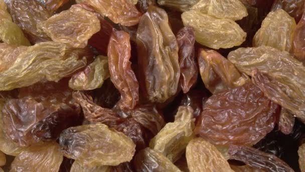 Rotation of raisin close-up. Dried grapes. Delicious dried fruit. Dried berries. - Footage, Video