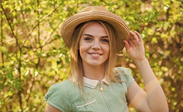 Rustic soul. Straw hat adorable girl. Rustic outfit. Ranch culture. Western traditions. Fancy smiling girl wear hat and dress. Fashion style concept. Rustic style. Romantic daydreamer in summer hat - Foto, imagen