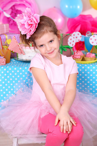 Pretty little girl celebrate her birthday - Фото, изображение