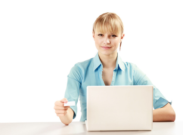 Attractive young woman with a laptop - Photo, Image