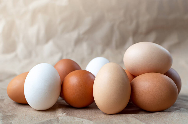 eggs on a craft paper background. - Fotografie, Obrázek