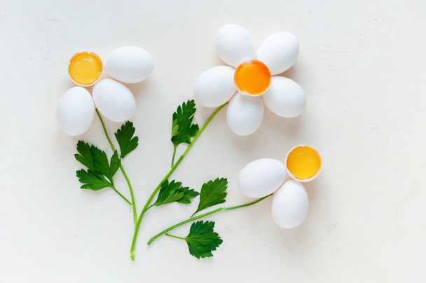 Eggs with parsley on a white background - Фото, зображення