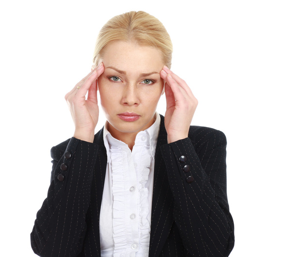 Businesswoman with a headache holding head - Photo, image