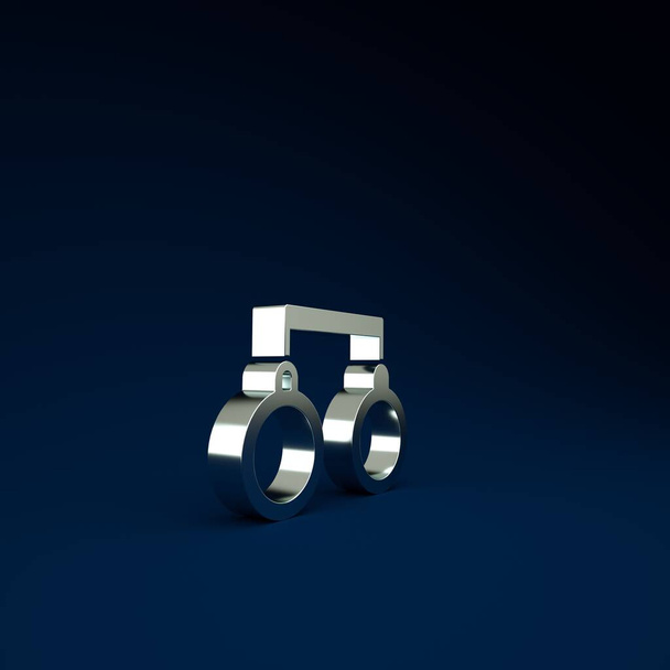 Ikona srebrnych kajdanek odizolowana na niebieskim tle. Koncepcja minimalizmu. Ilustracja 3D 3D renderowania. - Zdjęcie, obraz
