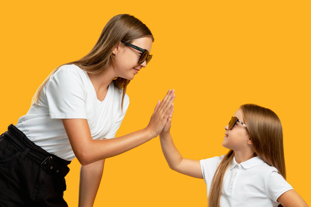 family team happy mother daughter girl high five - Фото, изображение