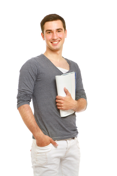 Young college guy with a  book - 写真・画像